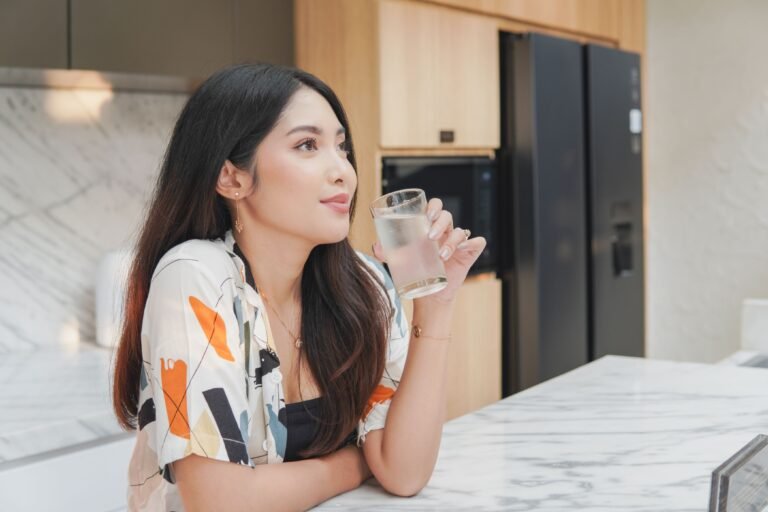 The Health Benefits of Filtered Water 1 A woman enjoy drinking cold water